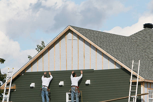 Professional Siding technician working in Cowansville, PA